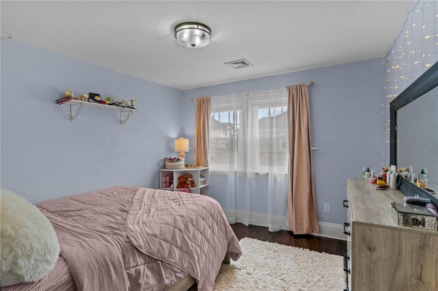 261 Columbus Ave, Pawtucket, RI 02861 - bedroom with dark wood-style flooring and baseboards