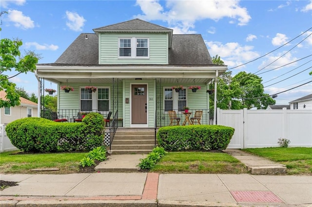 261 Columbus Ave, Pawtucket, RI 02861 - bungalow-style home featuring a porch and a shingled roof