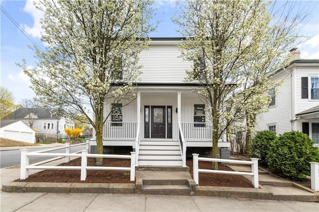 1314 Chalkstone Ave, Providence, RI 02908 - american foursquare style home featuring a porch and board and batten siding