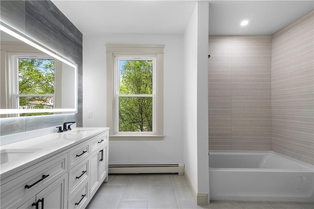 1314 Chalkstone Ave, Providence, RI 02908 - bathroom with a baseboard radiator, tile patterned floors, double vanity, and baseboards