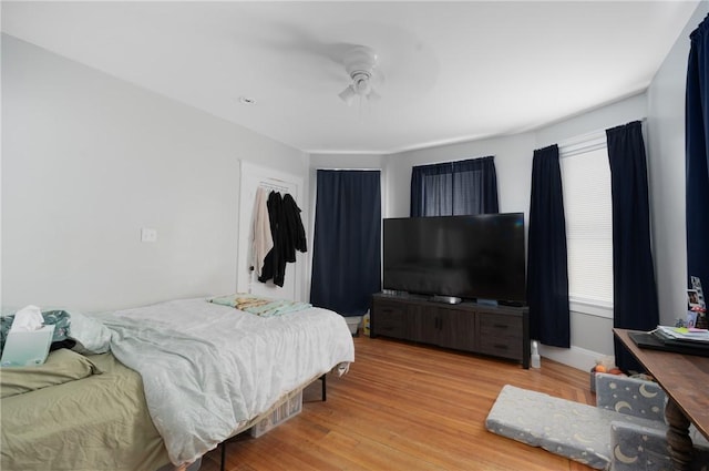 bedroom with wood finished floors