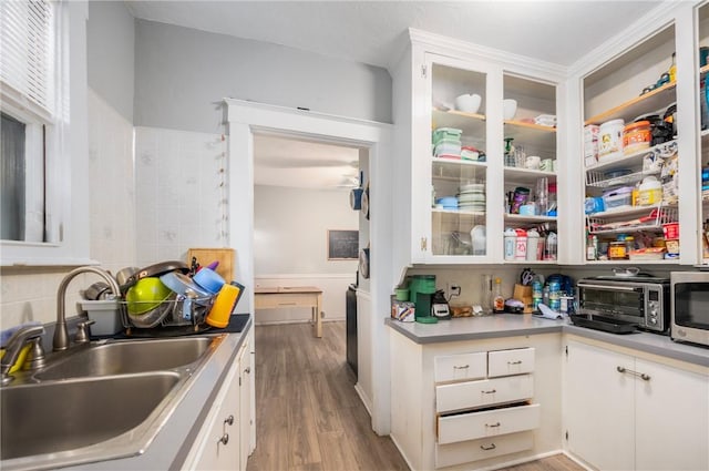 pantry featuring a sink