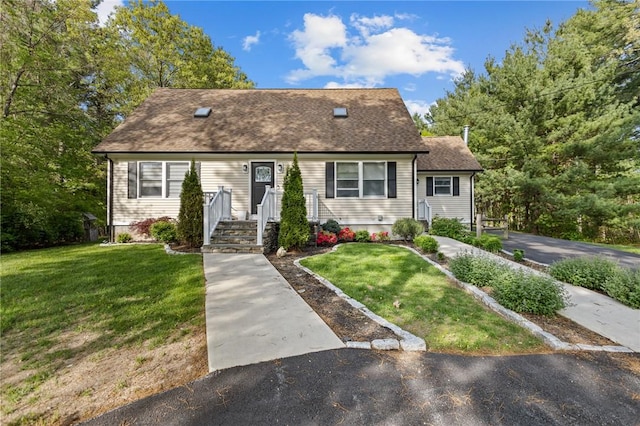 96 Hemlock Farm Trl, Burrillville, RI 02830 - view of front of house with a front lawn and a shingled roof