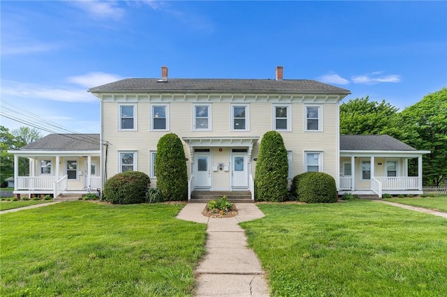 2 Francis St, Coventry, RI 02816 - view of front of house featuring covered porch, a front yard, and a chimney