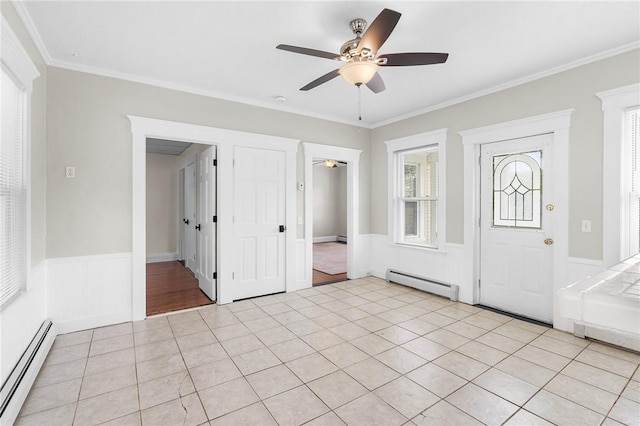 2 Francis St, Coventry, RI 02816 - foyer entrance with a baseboard radiator, a ceiling fan, a wainscoted wall, crown molding, and light tile patterned floors
