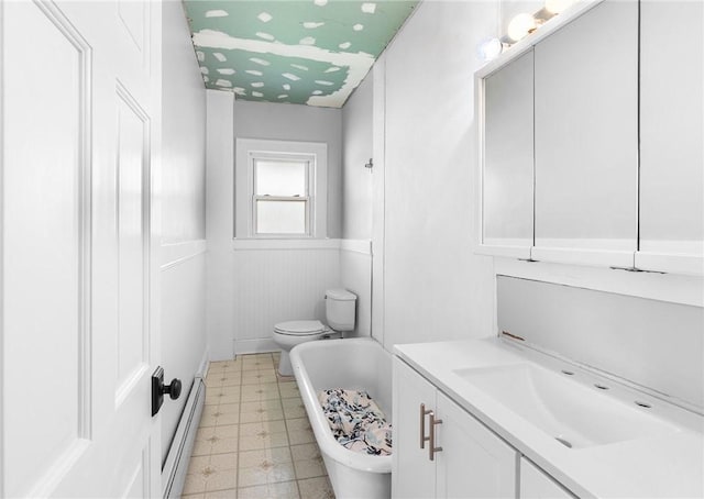 2 Francis St, Coventry, RI 02816 - full bath with toilet, a baseboard radiator, a tub, vanity, and a wainscoted wall