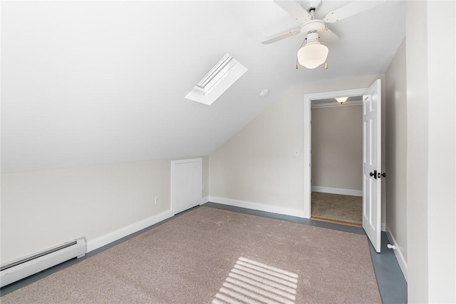 2 Francis St, Coventry, RI 02816 - additional living space featuring a baseboard heating unit, a skylight, vaulted ceiling, a ceiling fan, and baseboards