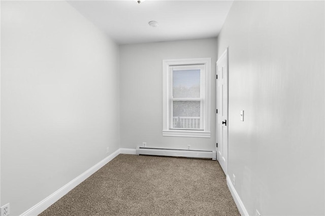 2 Francis St, Coventry, RI 02816 - carpeted spare room with baseboard heating and baseboards
