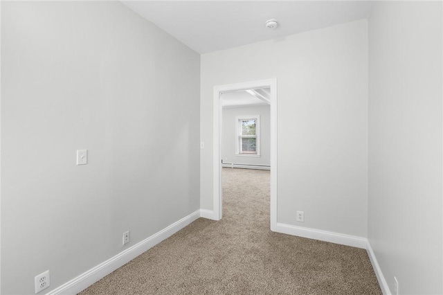 2 Francis St, Coventry, RI 02816 - carpeted empty room featuring baseboards, baseboard heating, and a smoke detector