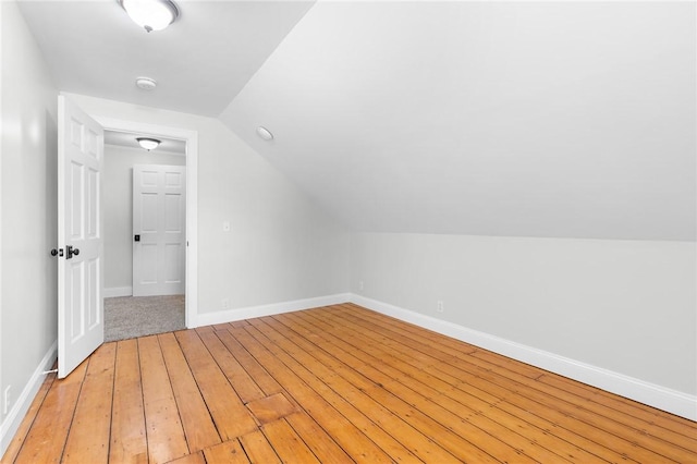 2 Francis St, Coventry, RI 02816 - bonus room with light wood-style flooring, vaulted ceiling, and baseboards