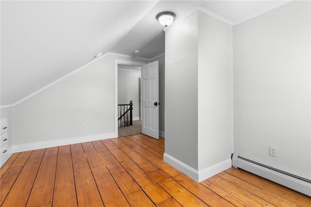 2 Francis St, Coventry, RI 02816 - bonus room with a baseboard heating unit, lofted ceiling, light wood-type flooring, and baseboards
