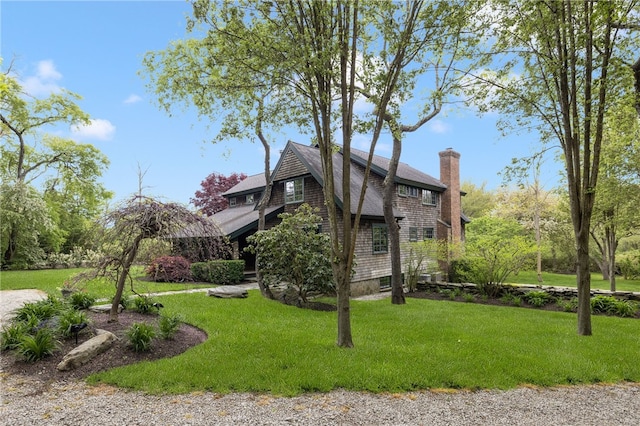 56 Summerfield Ln, Middletown, RI 02842 - view of property exterior featuring a chimney and a lawn