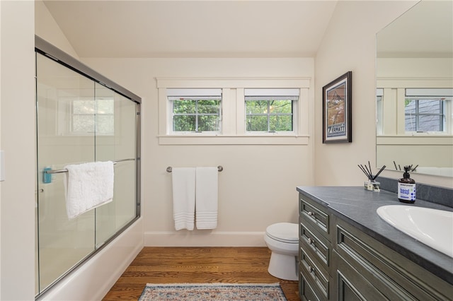56 Summerfield Ln, Middletown, RI 02842 - full bathroom featuring wood finished floors, vanity, toilet, shower / bath combination with glass door, and baseboards