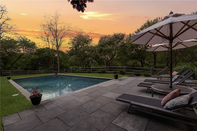 56 Summerfield Ln, Middletown, RI 02842 - pool at dusk featuring a patio area