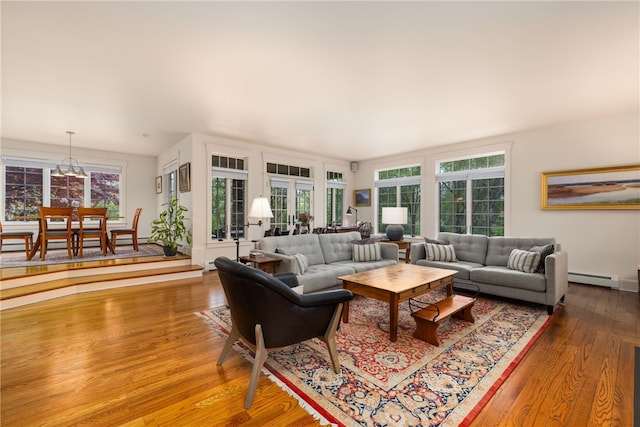 56 Summerfield Ln, Middletown, RI 02842 - living room featuring a baseboard radiator and wood finished floors