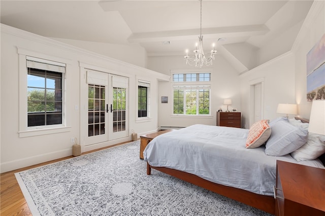 56 Summerfield Ln, Middletown, RI 02842 - bedroom with access to exterior, french doors, a chandelier, baseboards, and wood finished floors