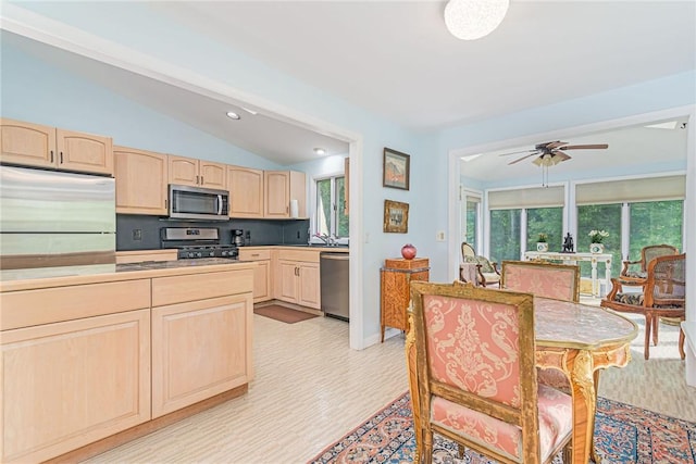 40 Haverhill Ave, North Kingstown, RI 02852 - kitchen featuring stainless steel appliances, light brown cabinets, lofted ceiling, healthy amount of natural light, and a ceiling fan