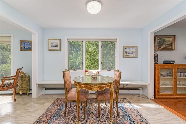 40 Haverhill Ave, North Kingstown, RI 02852 - dining area featuring baseboard heating and wood finished floors