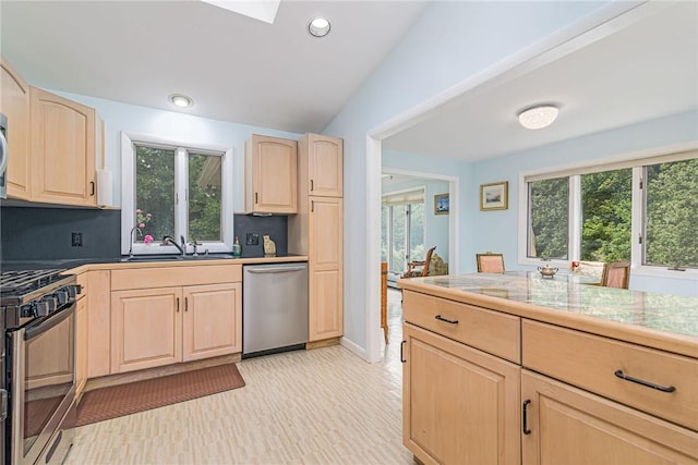 40 Haverhill Ave, North Kingstown, RI 02852 - kitchen featuring light brown cabinetry, stainless steel appliances, a sink, backsplash, and recessed lighting