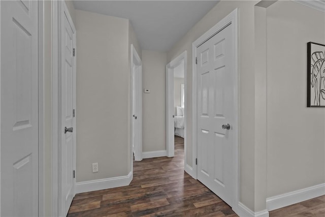 104 Liberty St, Pawtucket, RI 02861 - hallway featuring dark wood-type flooring and baseboards