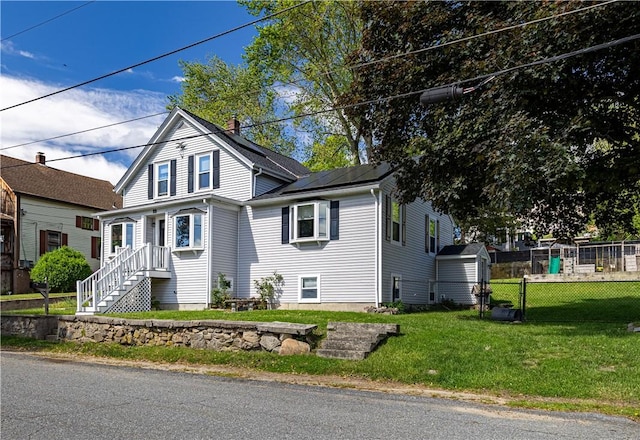99 Fairfield Ave, Woonsocket, RI 02895 - view of front of house with solar panels