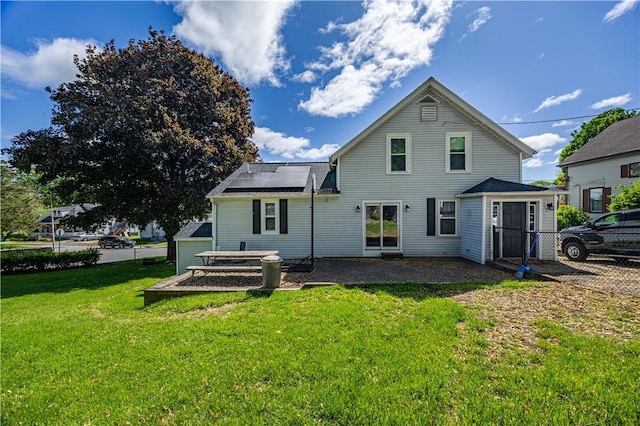 99 Fairfield Ave, Woonsocket, RI 02895 - back of property featuring roof mounted solar panels
