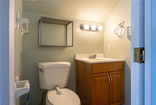99 Fairfield Ave, Woonsocket, RI 02895 - bathroom featuring vaulted ceiling, toilet, and vanity