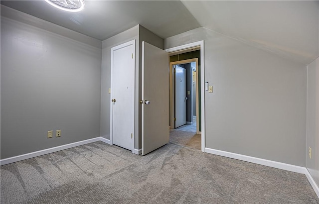 99 Fairfield Ave, Woonsocket, RI 02895 - additional living space featuring carpet flooring, vaulted ceiling, and baseboards