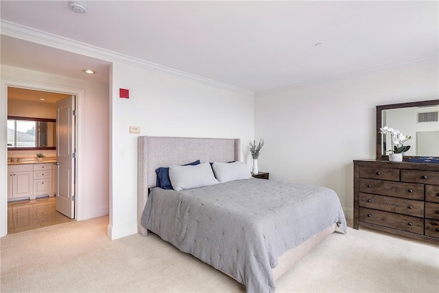 1 Tower Dr Unit 203, Portsmouth, RI 02871 - bedroom with light colored carpet, ornamental molding, baseboards, and ensuite bathroom