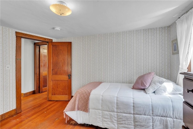 72 Old Danielson Pike, Foster, RI 02825 - bedroom with light wood finished floors and wallpapered walls