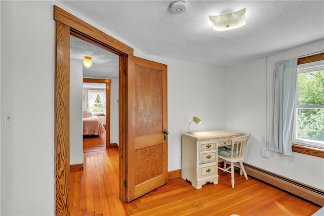 72 Old Danielson Pike, Foster, RI 02825 - office featuring light wood finished floors, a baseboard heating unit, and baseboards