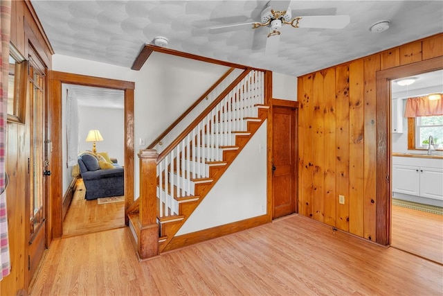72 Old Danielson Pike, Foster, RI 02825 - stairs featuring wood finished floors, ceiling fan, wood walls, and baseboards