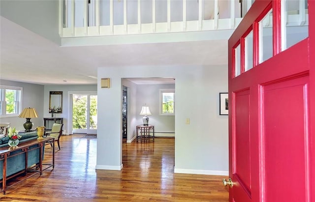 9 Misty River Ter, Narragansett, RI 02874 - entryway featuring wood finished floors, a towering ceiling, and baseboards