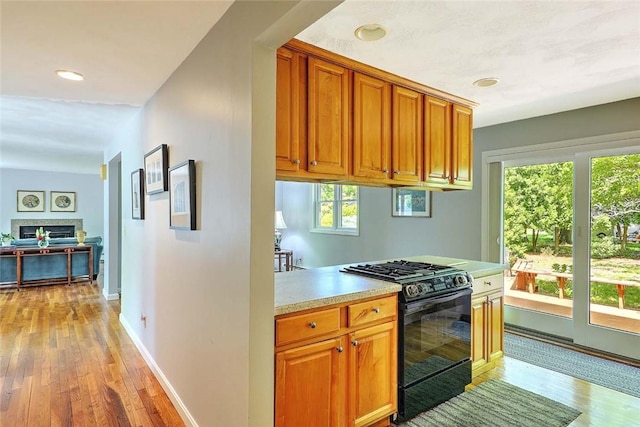 9 Misty River Ter, Narragansett, RI 02874 - kitchen featuring gas stove, light wood-type flooring, light countertops, healthy amount of natural light, and recessed lighting