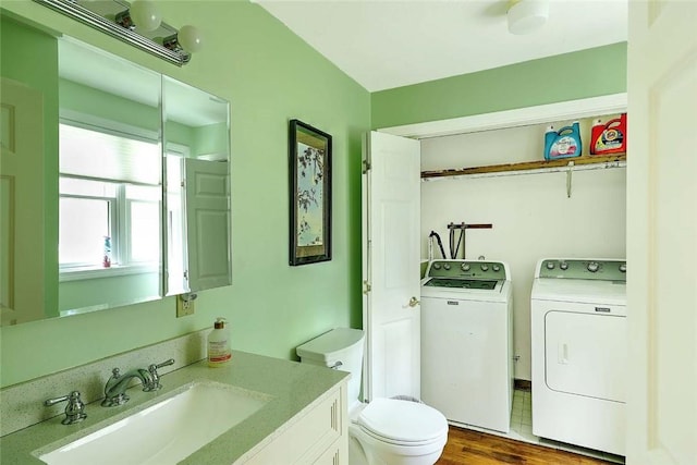 9 Misty River Ter, Narragansett, RI 02874 - bathroom with separate washer and dryer, vanity, toilet, and wood finished floors