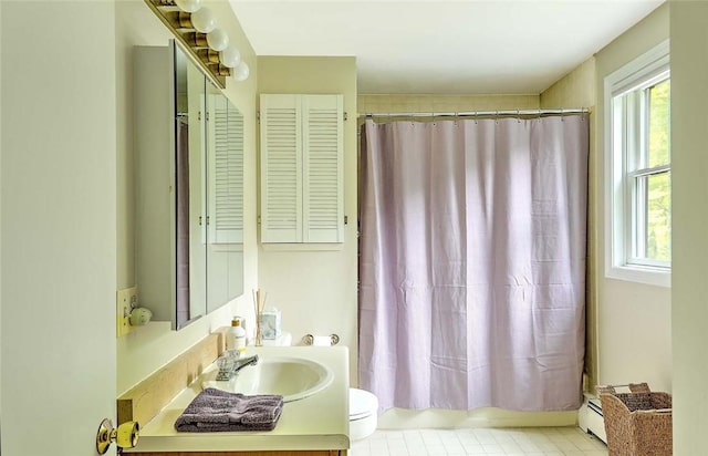 9 Misty River Ter, Narragansett, RI 02874 - full bathroom featuring vanity, toilet, a baseboard heating unit, and shower / bath combination with curtain
