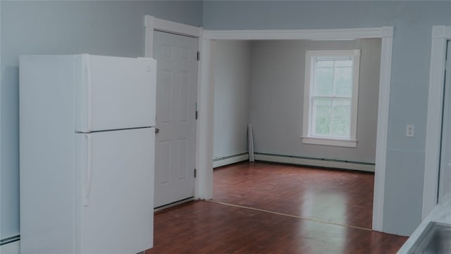 45 Ross St, Woonsocket, RI 02895 - kitchen featuring freestanding refrigerator, wood finished floors, a baseboard heating unit, and baseboard heating