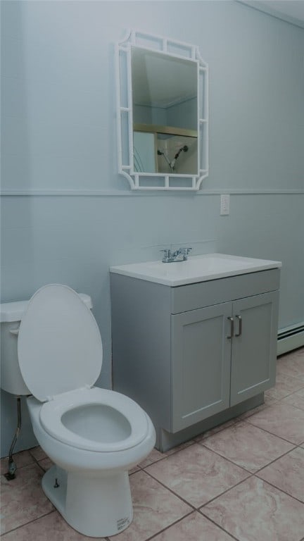 45 Ross St, Woonsocket, RI 02895 - bathroom with a baseboard radiator, toilet, vanity, tile patterned floors, and a shower