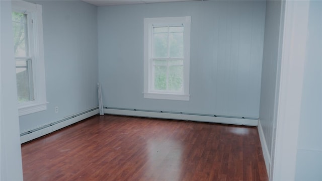 45 Ross St, Woonsocket, RI 02895 - unfurnished room with a baseboard radiator, wood finished floors, and baseboards