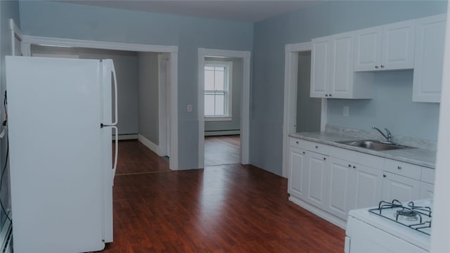 45 Ross St, Woonsocket, RI 02895 - kitchen with white appliances, a sink, a baseboard heating unit, baseboard heating, and light countertops