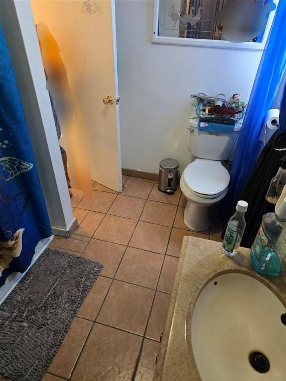 20 Pennsyjvania Ave, Providence, RI 02905 - full bath featuring a sink, tile patterned flooring, and toilet