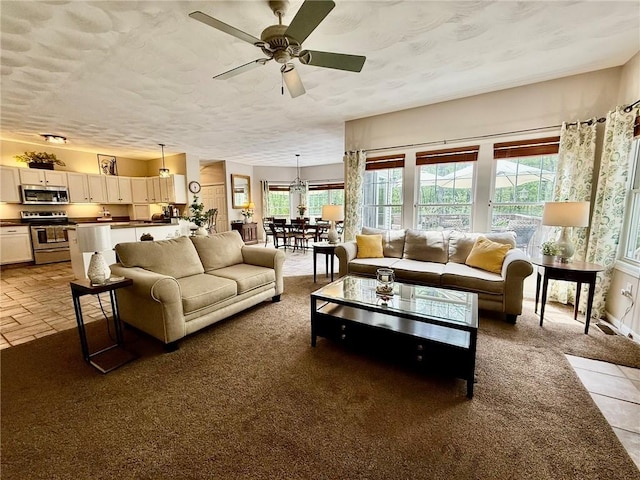 36 Jasmine Cir, North Kingstown, RI 02874 - living room featuring ceiling fan