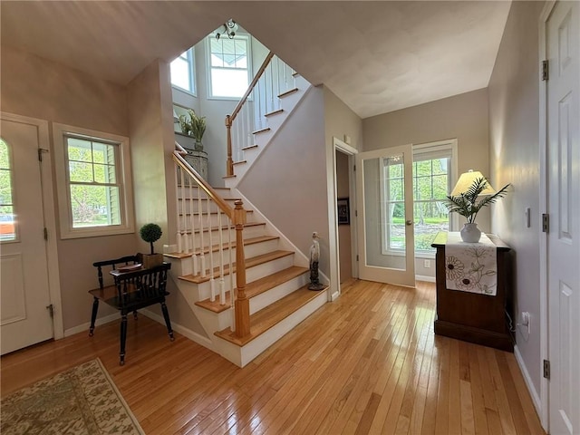 36 Jasmine Cir, North Kingstown, RI 02874 - entrance foyer featuring light wood-style floors, stairway, healthy amount of natural light, and baseboards