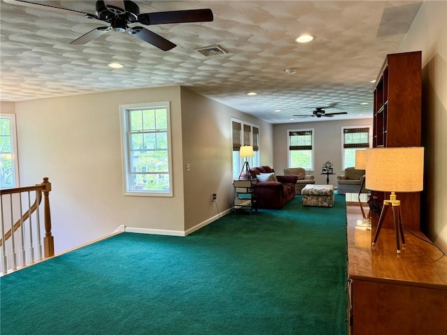 36 Jasmine Cir, North Kingstown, RI 02874 - living area featuring ceiling fan, dark carpet, baseboards, and recessed lighting