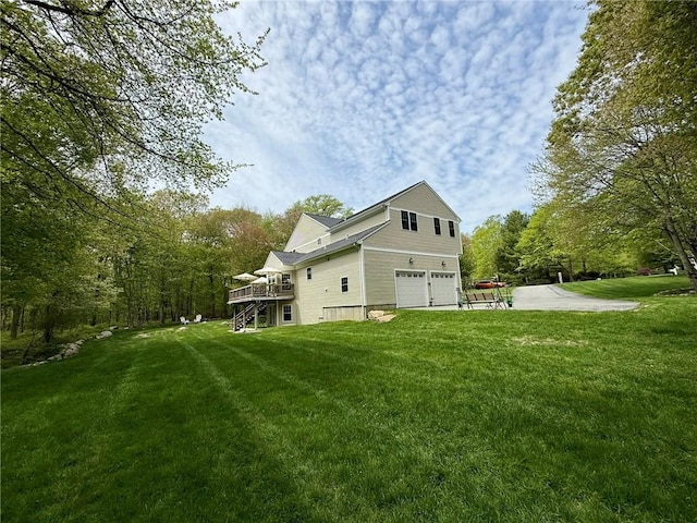 36 Jasmine Cir, North Kingstown, RI 02874 - view of side of home featuring an attached garage, stairs, a yard, a deck, and driveway