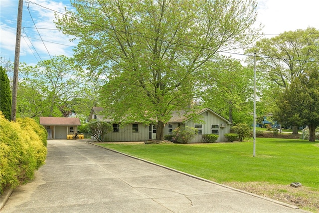 140 Baycliff Dr, Warwick, RI 02818 - view of front of property with driveway and a front yard