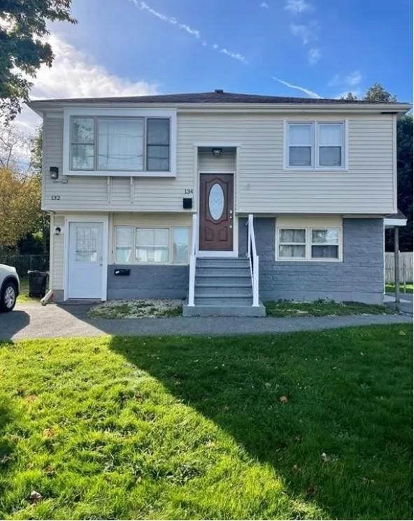 132 Maple Ave, Middletown, RI 02842 - split foyer home with entry steps and a front yard