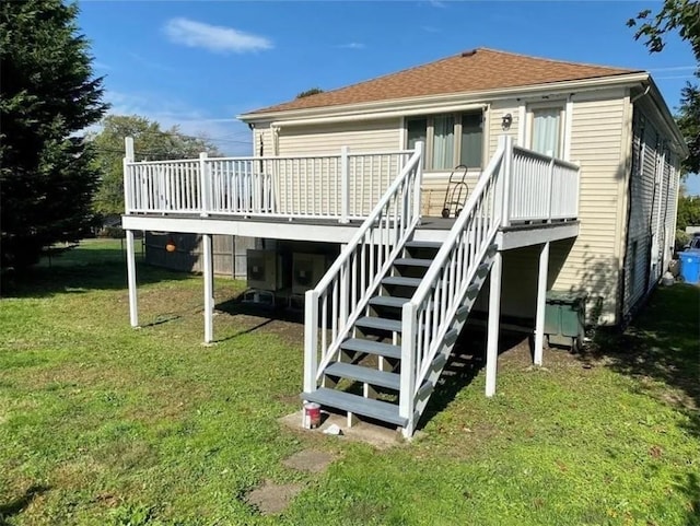 132 Maple Ave, Middletown, RI 02842 - rear view of property with stairs, a wooden deck, a lawn, and a shingled roof