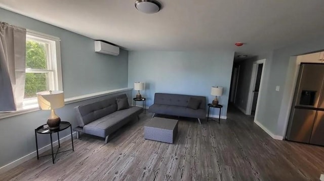 132 Maple Ave, Middletown, RI 02842 - living area featuring wood finished floors, a wall mounted air conditioner, and baseboards