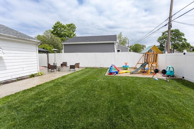 60 Sumach Ave, East Providence, RI 02915 - view of yard with a playground, a fire pit, and a patio